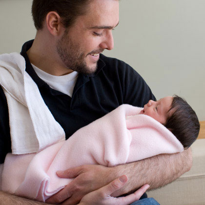 Dad with newborn baby (Babble)